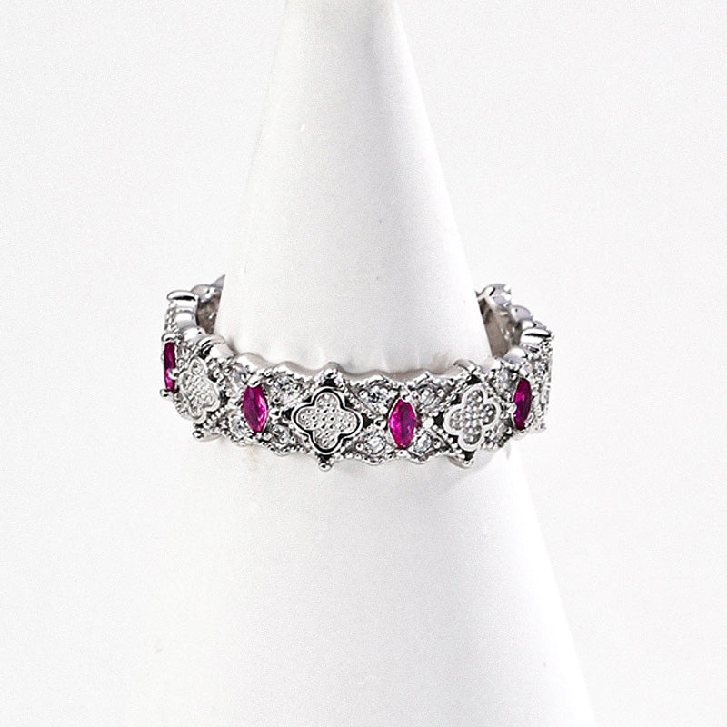 A silver-plated version of the vintage S925 ring, showcasing intricate zircon accents and ruby tones.