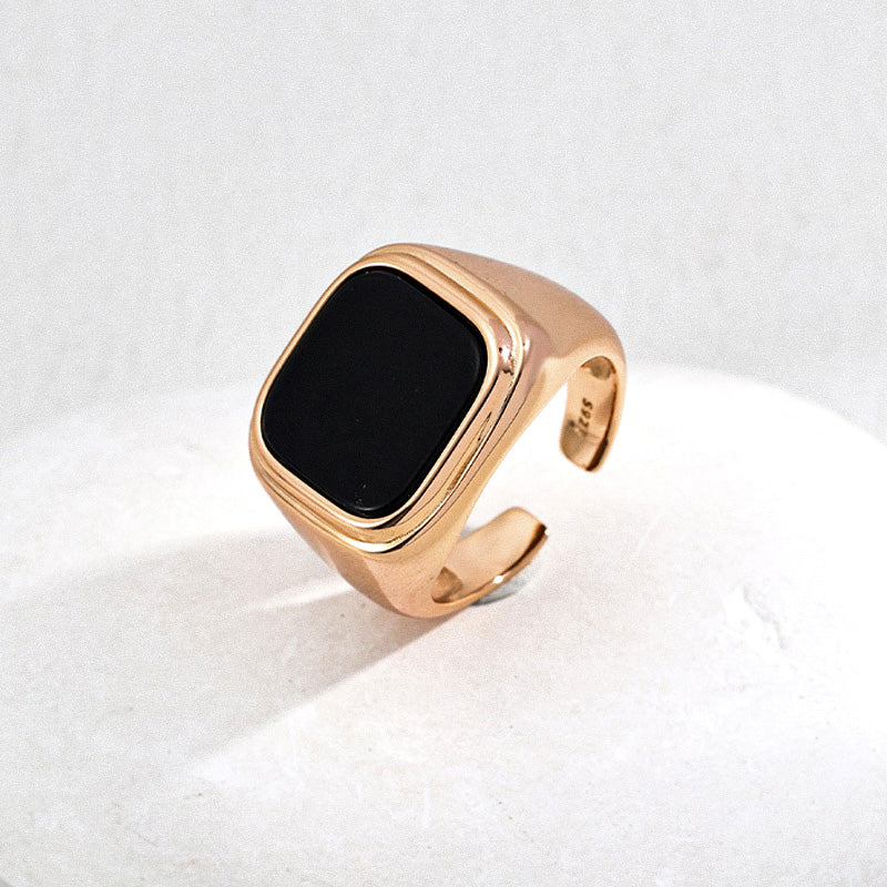 Gold-toned S925 silver signet ring with deep black onyx — a symbol of quiet confidence and inner grounding.